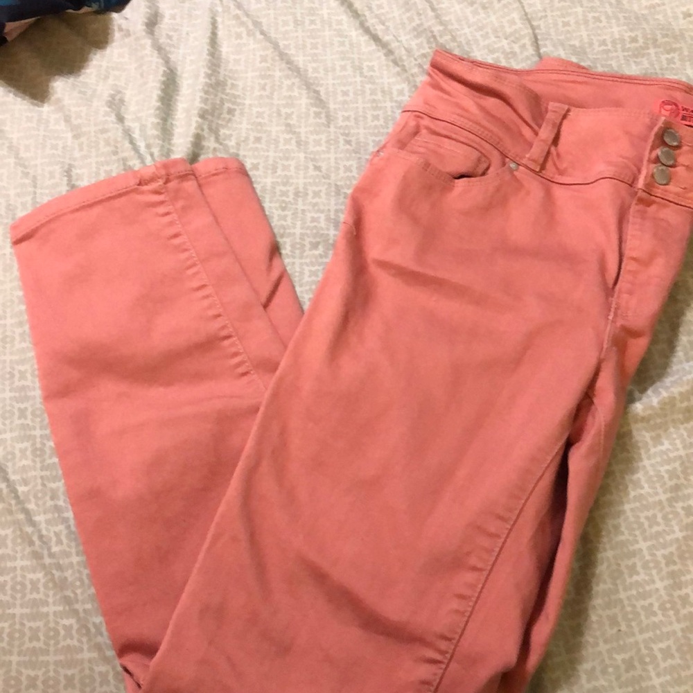 Blush pink skinny jeans